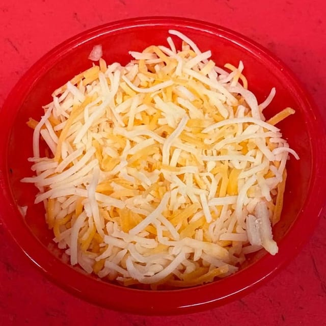 Side of Shredded Cheese.
